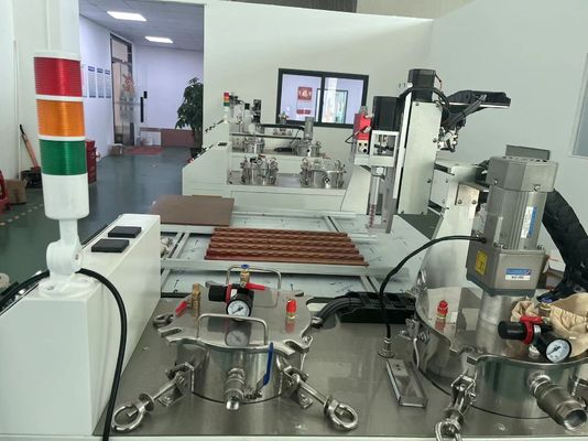 Macchine per la preparazione di vasi a due parti di resina epossidica